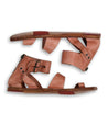 A pair of Bed Stu Afrodita sandals with straps and buckles.