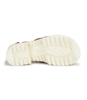 A pair of Pacifica sandals with white soles on a white background by Bed Stu.