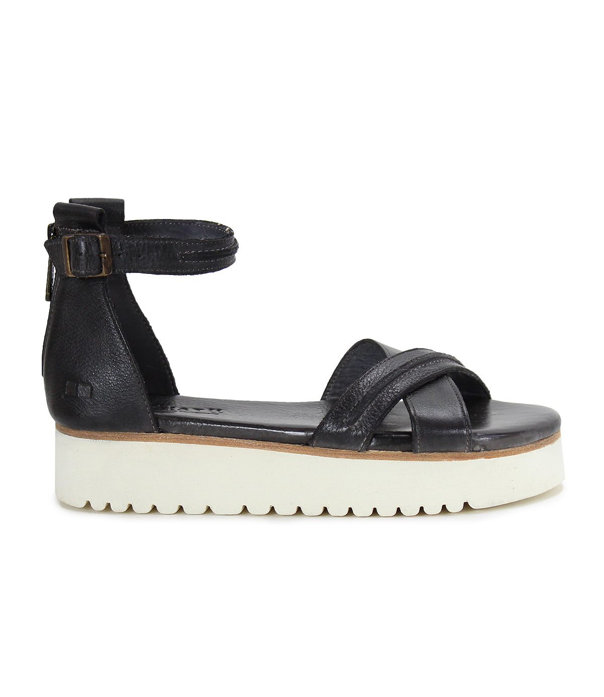 A women's black leather Carroll sandal with a white sole by Bed Stu.