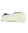 A Bed Stu Carroll women's sandal with white soles on a white background.