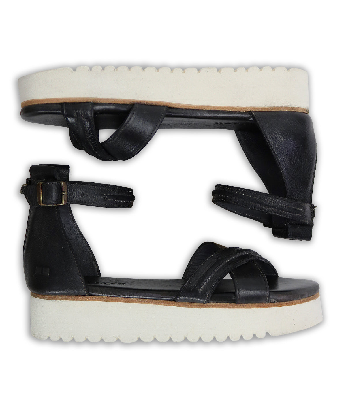 A pair of Bed Stu Carroll black leather sandals on a white background.
