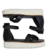A pair of Bed Stu Carroll black leather sandals on a white background.