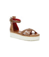 A Carroll sandal from Bed Stu, with two straps and a white sole.