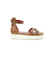 A women's Carroll sandal with two straps and a white sole by Bed Stu.