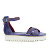 A women's blue leather sandal with two straps and a white sole, the Carroll sandal by Bed Stu.