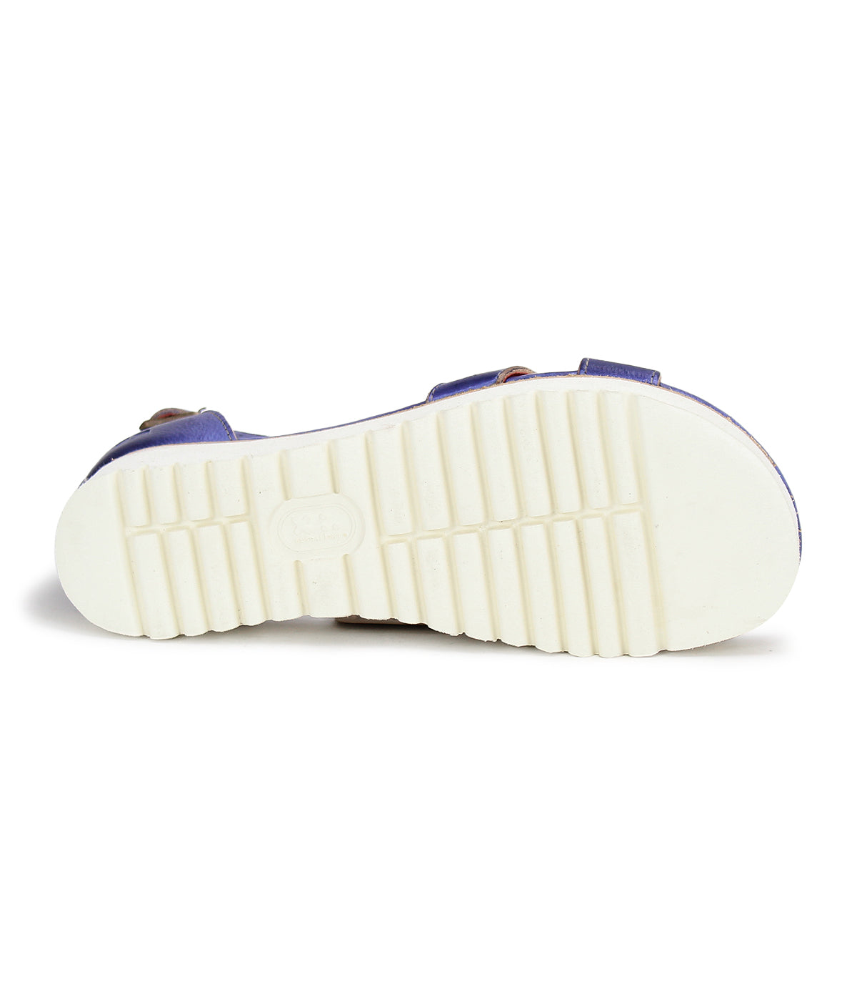 A pair of Carroll blue sandals with white soles on a white background, by Bed Stu.