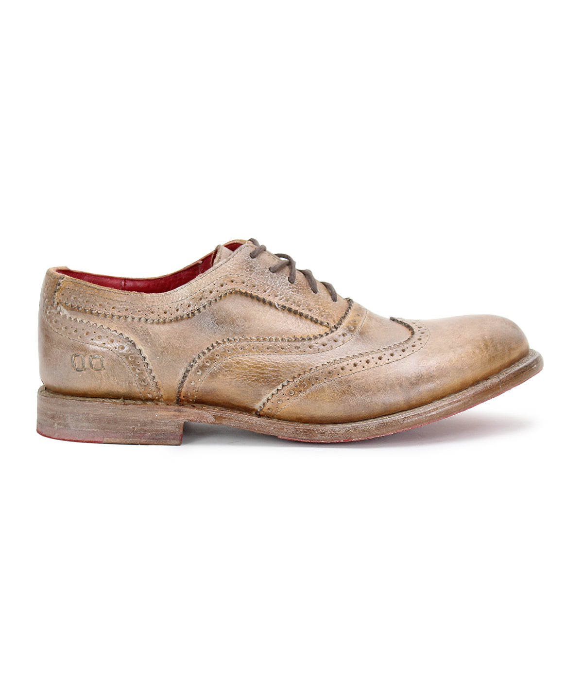 A distressed tan wingtip oxford shoe called Lita by Bed Stu.