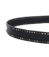 A black leather Staple belt by Bed Stu with studding on it.