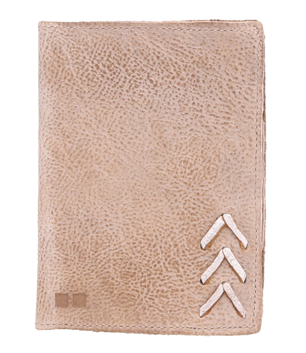 A beige leather Stardust wallet with an arrow on it by Bed Stu.