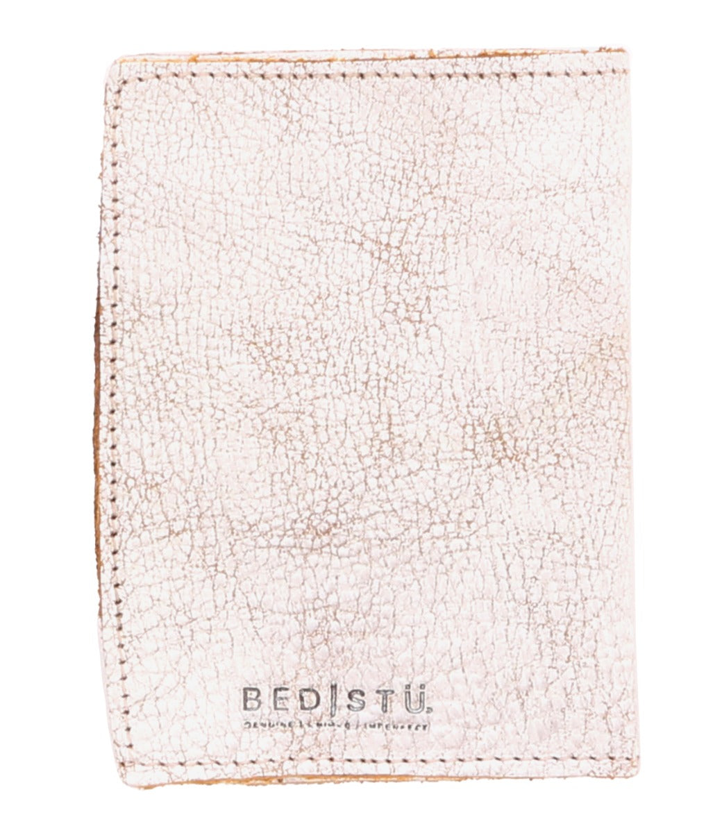 A white leather Stardust wallet with the word 'lifestyle' on it, by Bed Stu.