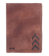 A brown leather Stardust wallet from Bed Stu with an arrow on it.