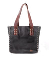 A vintage-chic black leather Stevie tote bag with brown handles by Bed Stu.