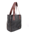 A black leather Stevie tote bag showcasing durability and vintage-chic sophistication by Bed Stu.