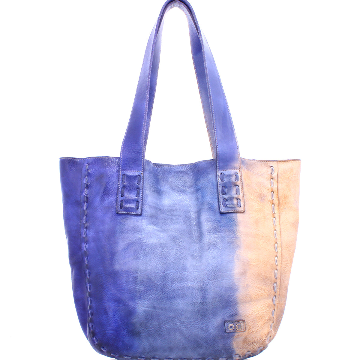 The Bed Stu Stevie tote bag showcases vintage-chic sophistication with its blue and tan leather, embodying the elegance of old-world craftsmanship.