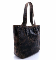 A Stevie black leather tote bag with rivets by Bed Stu.