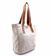 A Stevie tote bag by Bed Stu with brown handles.