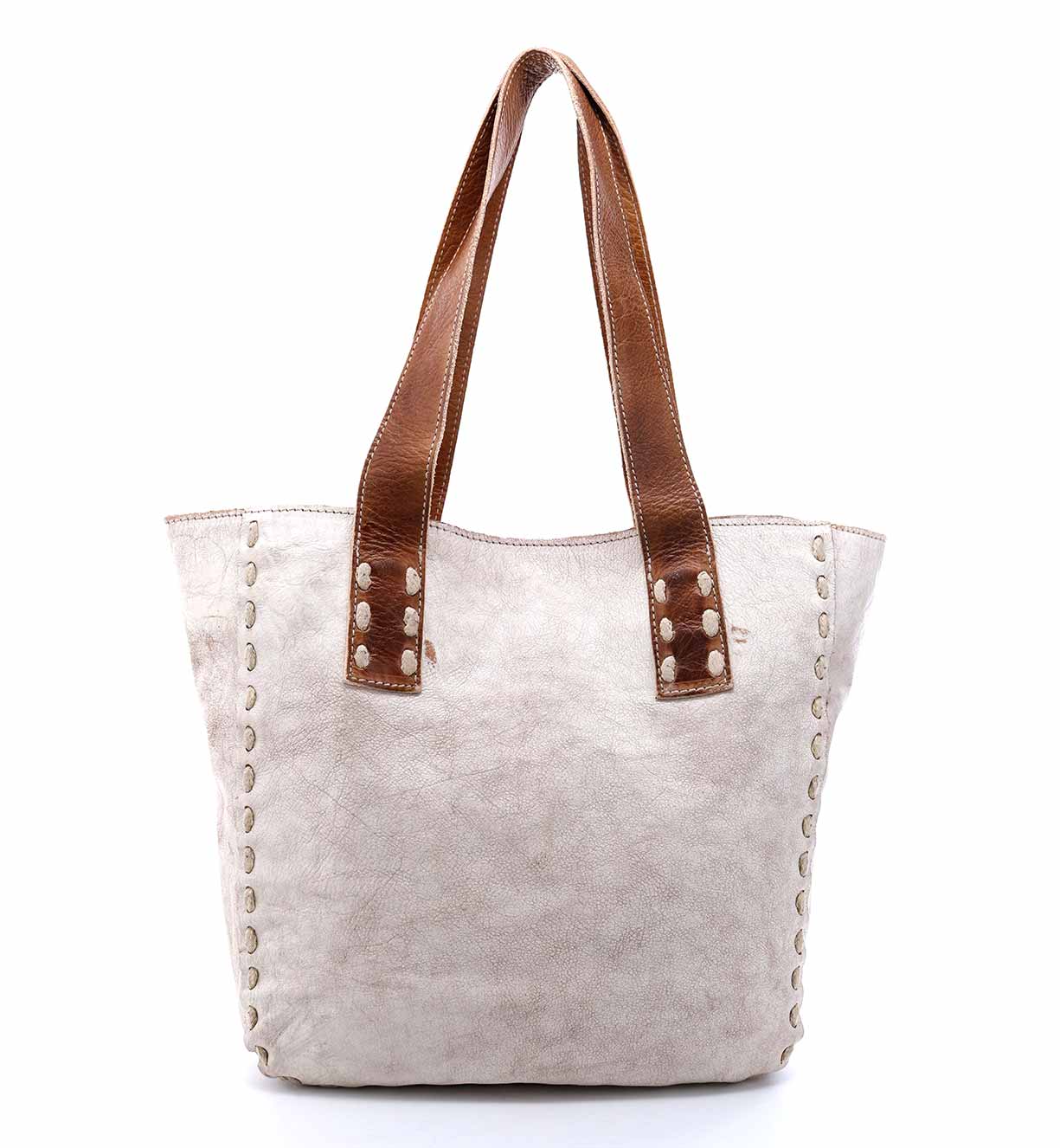 A white Stevie tote bag with brown handles by Bed Stu.