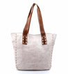 A white Stevie tote bag with brown handles by Bed Stu.