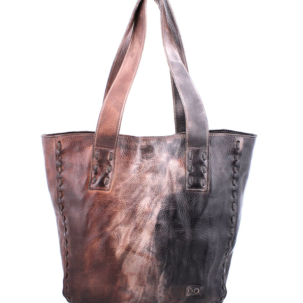 A brown and black Stevie leather tote bag by Bed Stu.