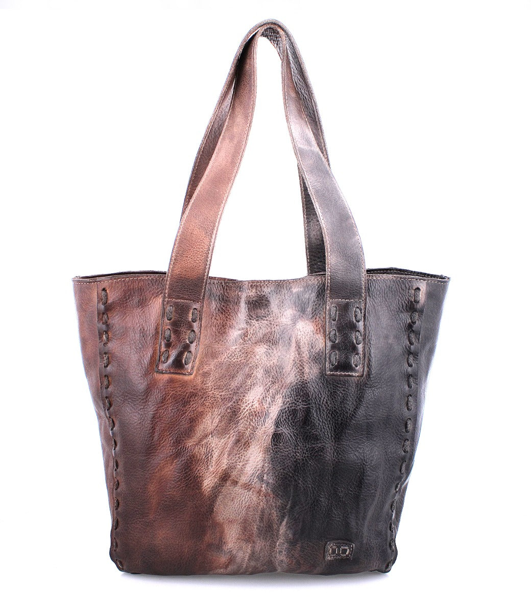 A brown and black Stevie leather tote bag by Bed Stu.