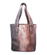A Stevie brown leather tote bag on a white background by Bed Stu.