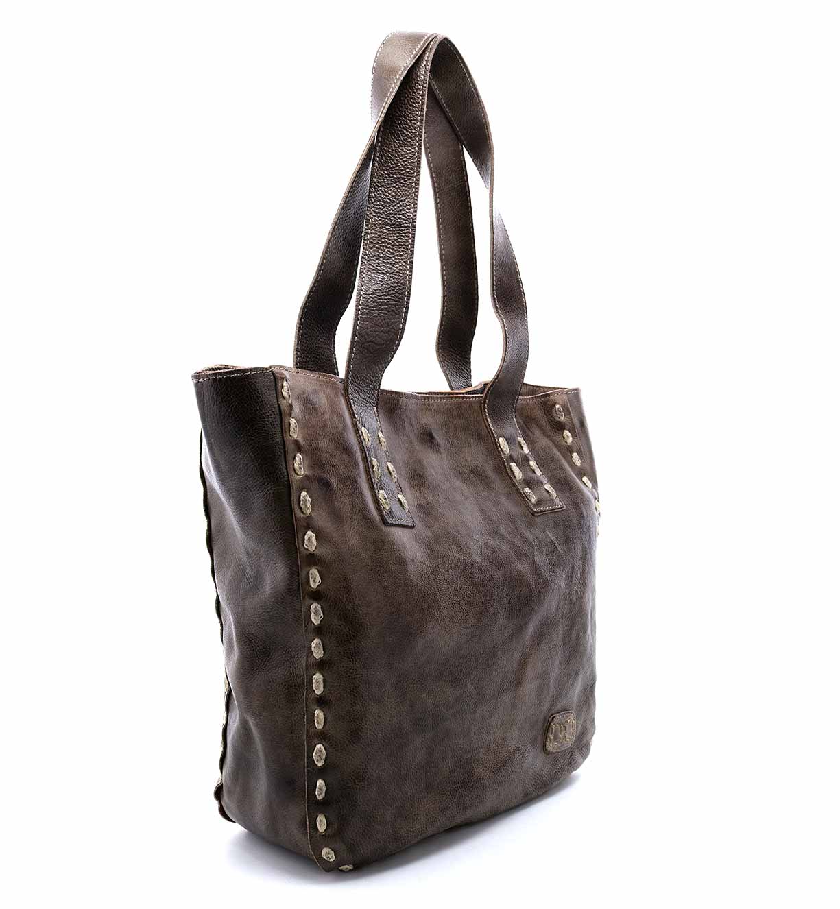 A brown leather Stevie tote bag with rivets by Bed Stu.