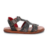 A pair of Bed Stu black sandals with red straps and buckles named Sue.