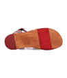 A pair of Sue sandals with red and brown straps by Bed Stu.