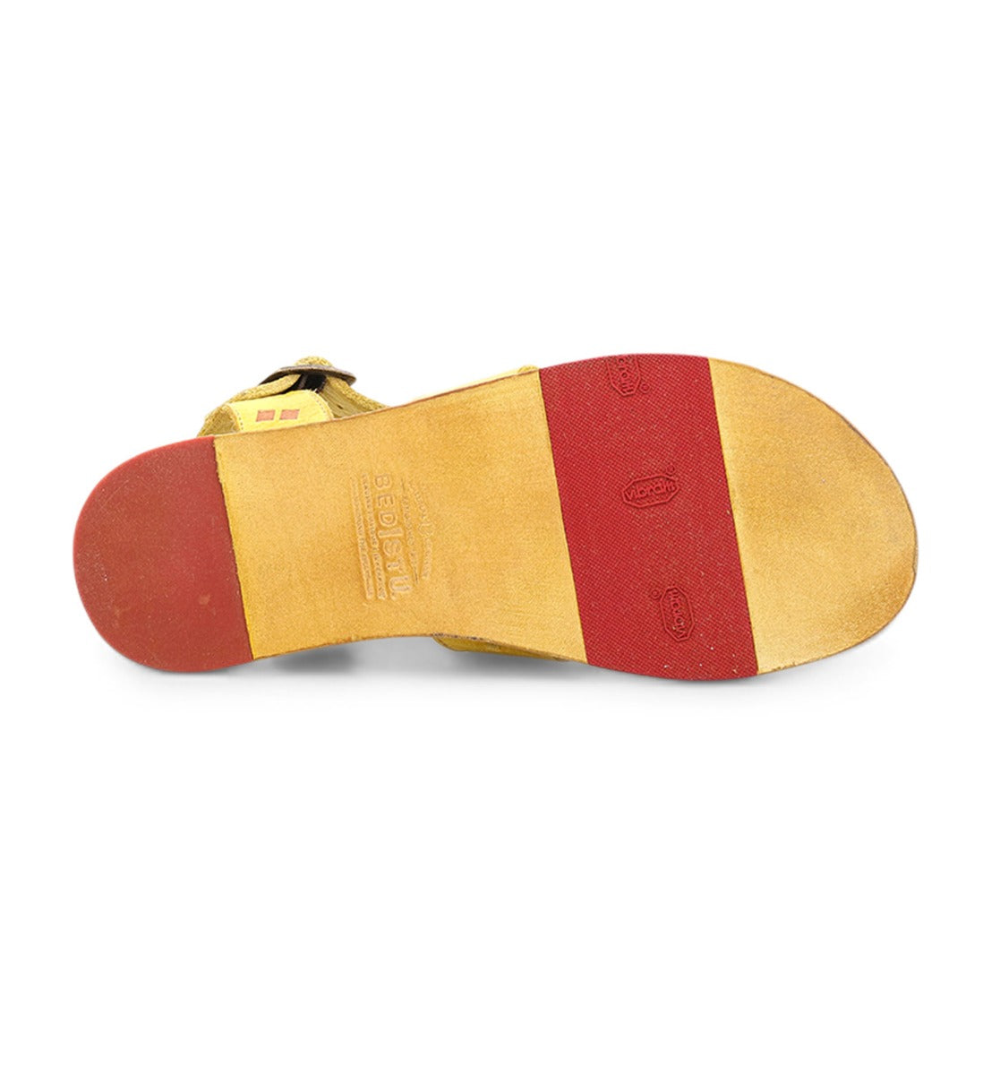 A pair of Sue sandals with red and yellow straps from Bed Stu.