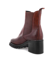 The Bed Stu Surge women's Chelsea boot features a higher heel in brown.
