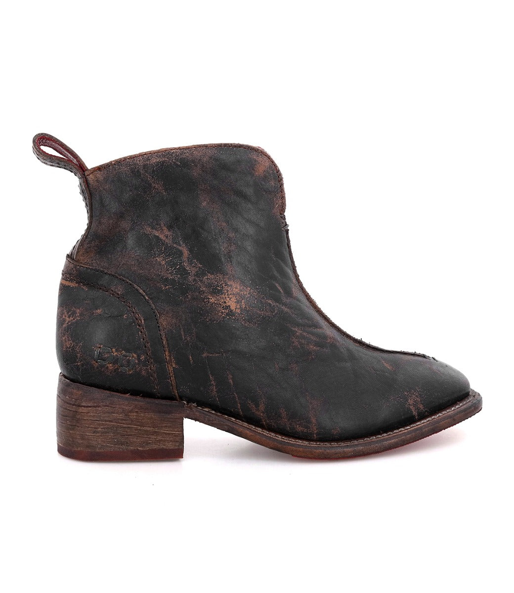 A black leather ankle boot with a wooden heel called the Tabitha by Bed Stu.