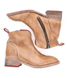 A pair of Tabitha by Bed Stu tan leather ankle boots.