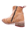 A Tabitha ankle boot by Bed Stu, made of tan leather with a zipper on the side.