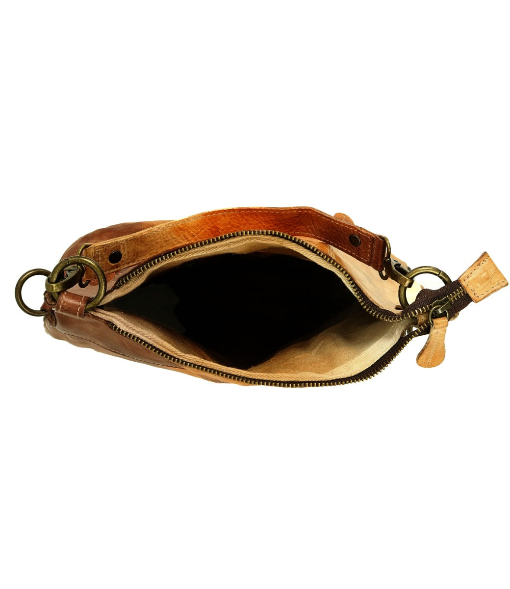 The inside of a Tahiti brown leather purse from Bed Stu.