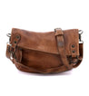 A brown leather crossbody bag with two straps, the Tahiti Bag by Bed Stu.