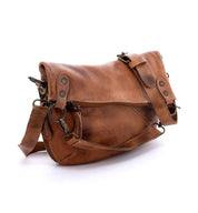 A Tahiti by Bed Stu brown leather crossbody bag on a white background.
