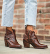 An image of a woman wearing Tania cowboy boots by Bed Stu.