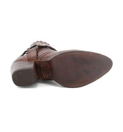 A Tania boot from Bed Stu, made of brown leather with a buckle on the side.