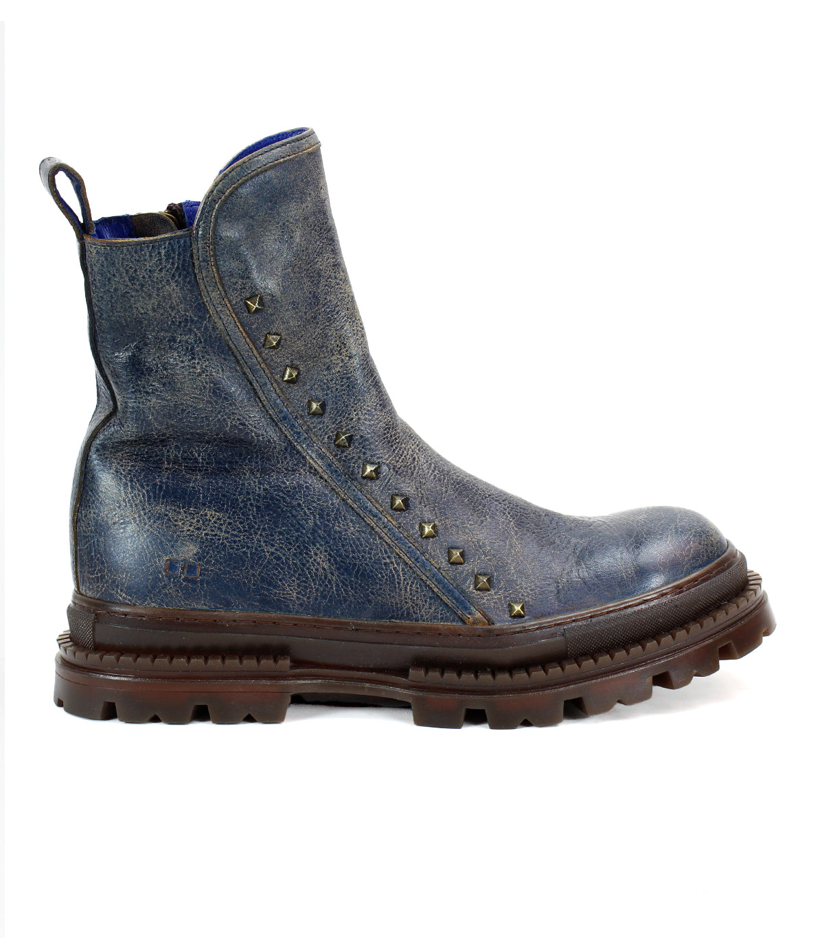 The Bed Stu Tanto is a single men's blue leather boot with European flair, featuring a lug outsole, decorative metal studs on the side, a side zipper, and a heel pull tab.