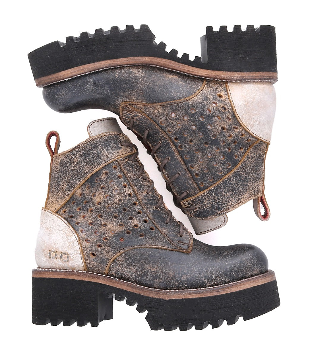 A pair of Bed Stu Tanzania women's boots with a leather sole.