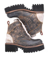 A pair of Bed Stu Tanzania women's boots with a leather sole.