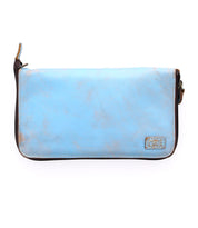 A Templeton II by Bed Stu blue leather wallet on a white background.