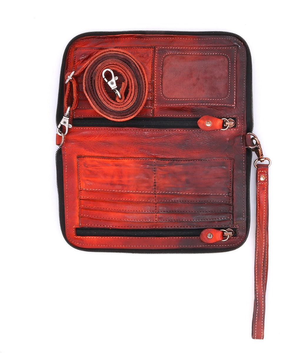 The inside of a Templeton II red leather multi-functional clutch from Bed Stu.