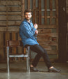 A man sitting on a Thorn chair.