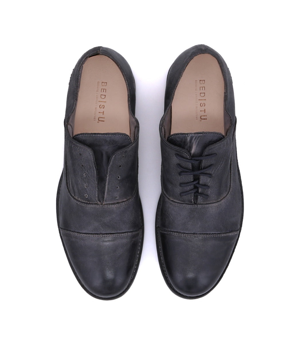 A pair of Bed Stu Thorn men's black leather shoes.
