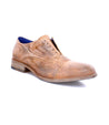 A pair of Thorn men's tan shoes by Bed Stu on a white background.