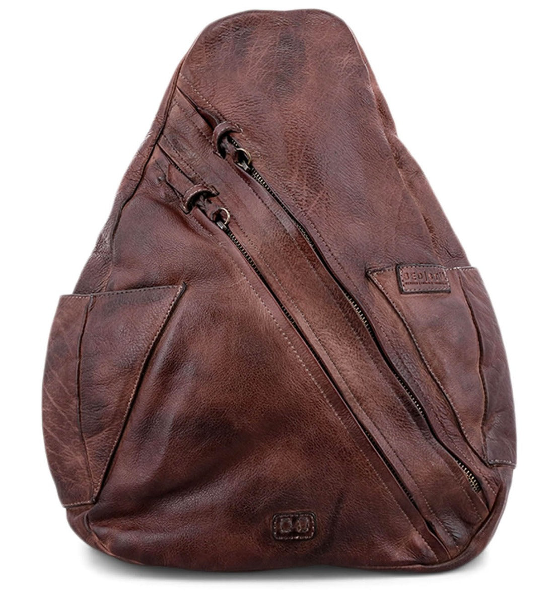 A brown leather Tommie backpack with a zipper from the Bed Stu brand name.