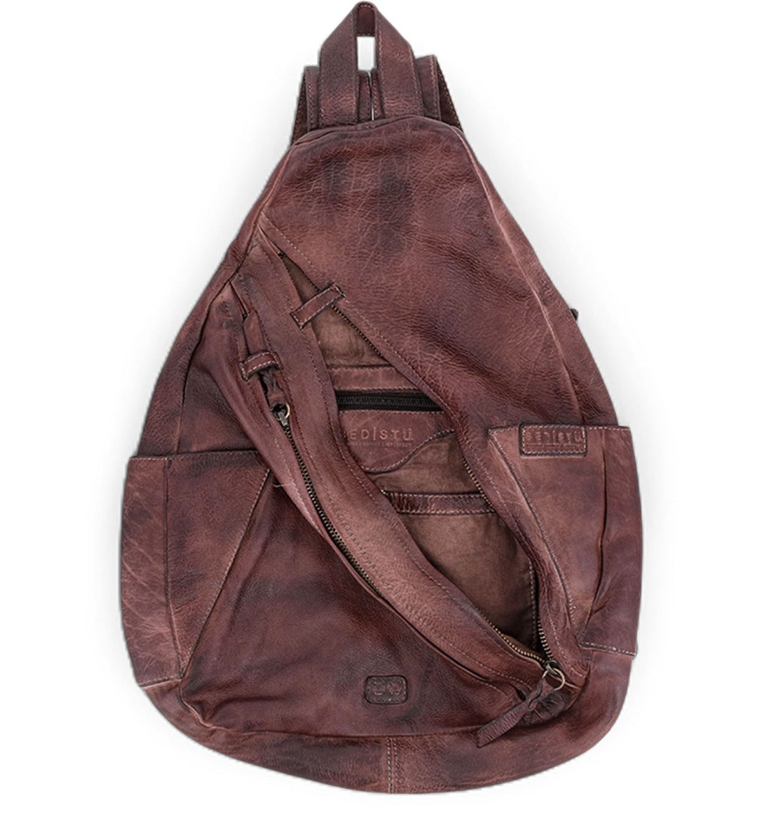 A brown leather Tommie backpack on a white background by Bed Stu.