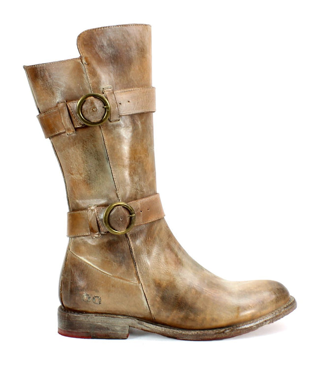 The Turn boot by Bed Stu, crafted from vegetable-tanned leather, features two decorative straps with buckle detail and a slightly worn appearance.