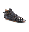 A black sandal with braided straps and buckles named Claire by Bed Stu.